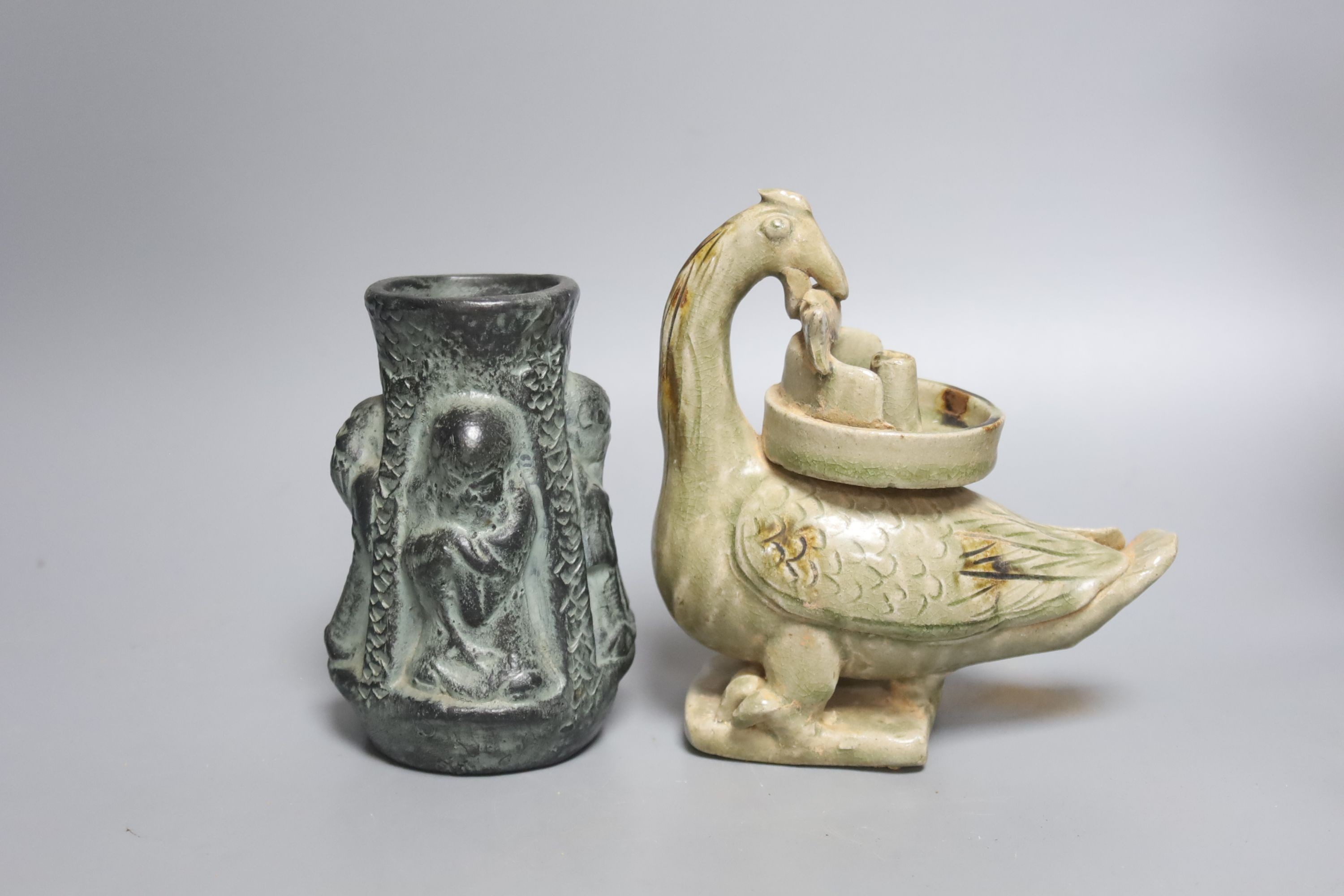 A Chinese Tang style sancai figure of a lady, a similar phoenix head ewer, a Yue type oil lamp and another vessel (4)